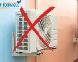 Un système split de climatisation est barré d'un gros X rouge.