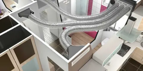 Vue en coupe d'une maison montrant les conduits d'un système de chauffage gainable. L'inconvénient chauffage gainable est l'encombrement des tuyaux dans les faux plafonds.