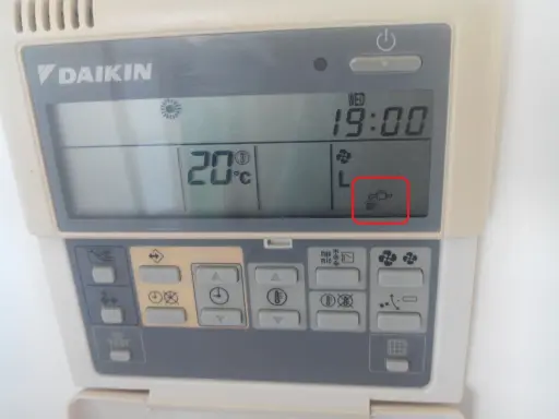 Symbole chauffage clim Daikin : icône de goutte d'eau indiquant le mode déshumidification.